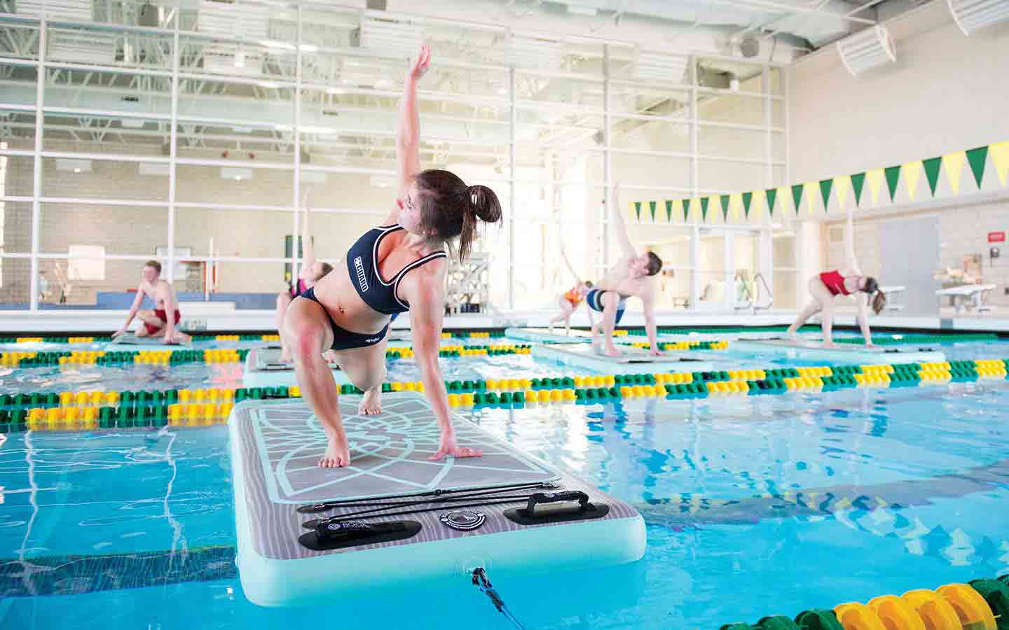 paddle-board yoga at wellness center