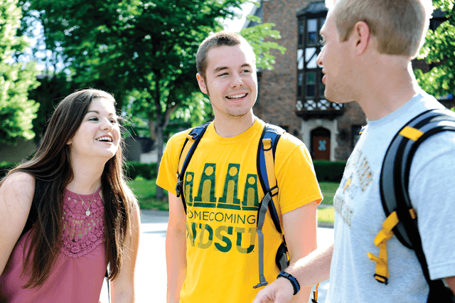 students talking outside