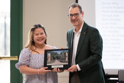 A photo of Gunkelman Award winner Chutikun “Chuti” Kanjanaruch and NDSU President David Cook